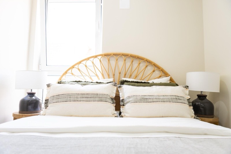 Bedroom with double bed and bedside lamps